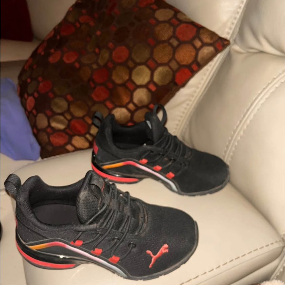 Puma Kids Black Sneakers with Red and Orange Accents